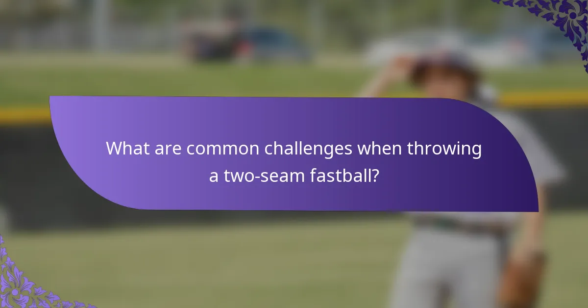What are common challenges when throwing a two-seam fastball?
